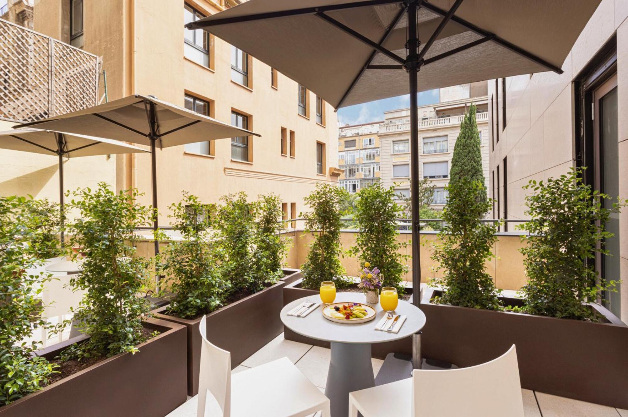 Eurostars Barcelona Central Exterior photo The hotel's terrace